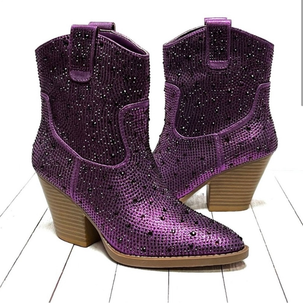 Womens purple rhinestone cowboy boots. Wore them once to Taylor Swift!